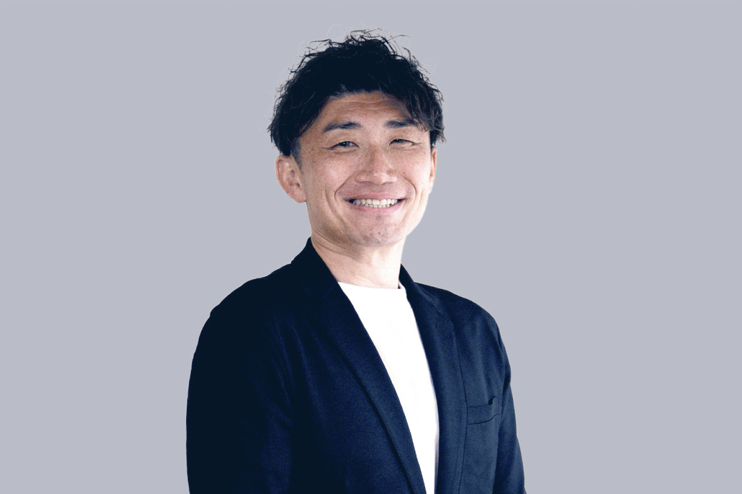 執行役員坂口のポートレート写真