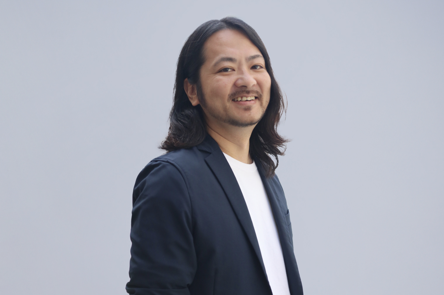 執行役員富田のポートレート写真